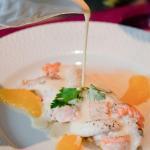 sole and salmon-tresse in orange butter sauce