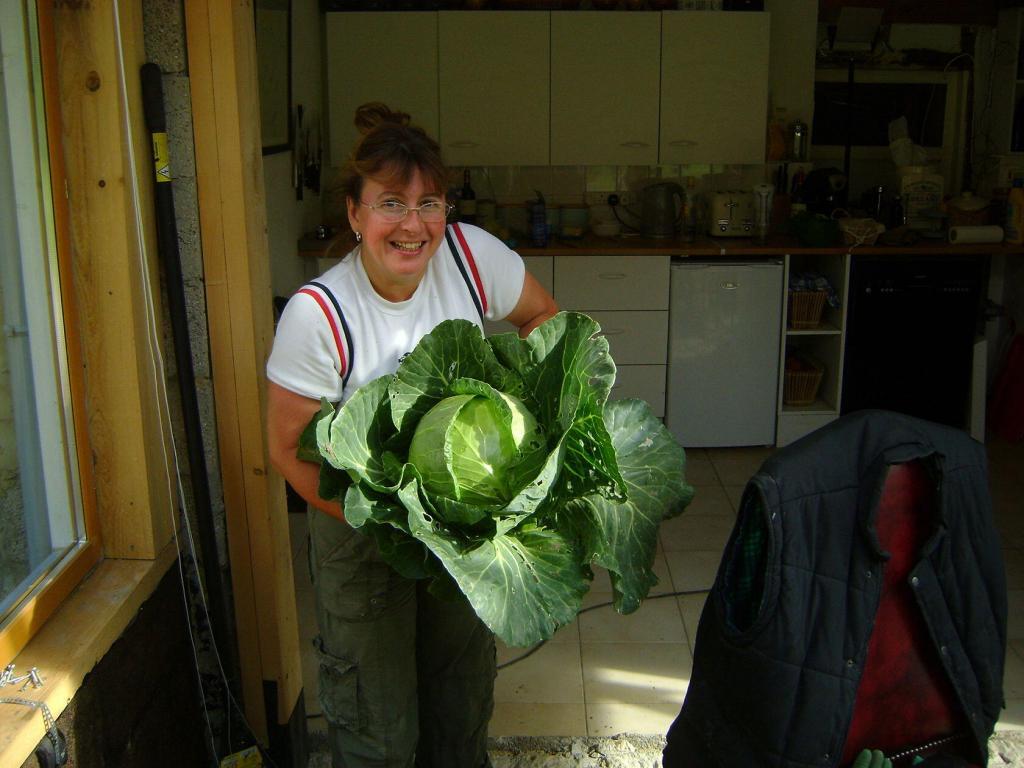 My Good Life France Janine Marsh with a cabbage from the garden