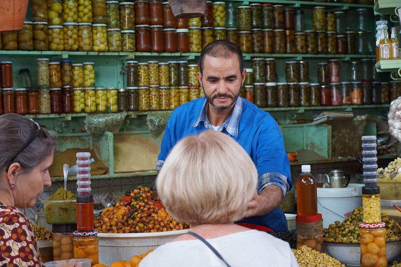 Marrakesh Olive Vendor Culinary Exploration Pitcher and Powell Adventures