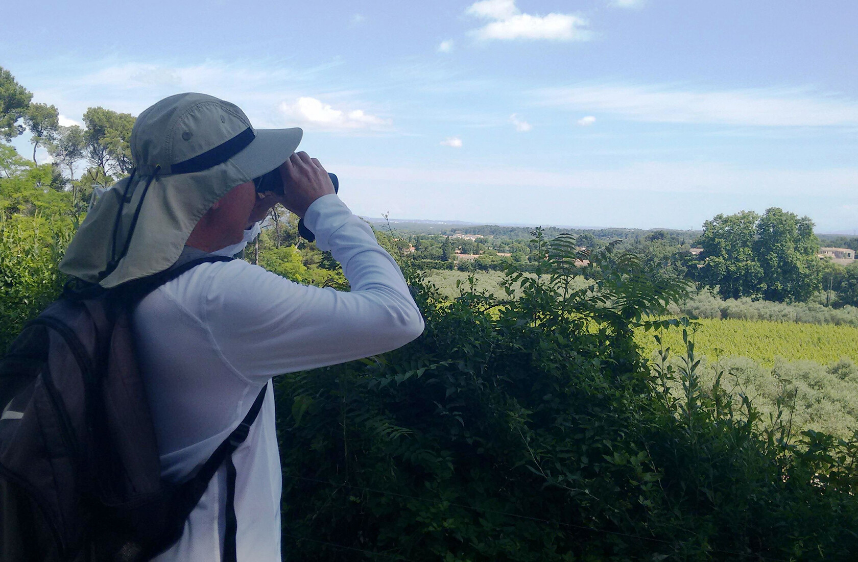St Remy Provence Lifestyle A birder scans the sky from the Voie Domitia