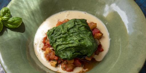Cod Fish Steamed in Spinach Leaves, Basil Ratatouille, White Wine Cream Sauce